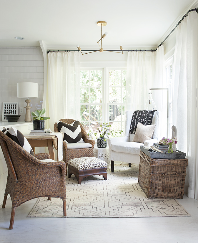 Sherry Hart interior design - a beautiful neutral sitting area in a kitchen with woven textures and black and white. #sherryhart #rusticmodern #neutraldecor #blackandwhitedecor